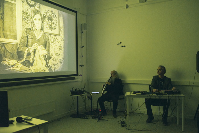 Sergey Letov (Roland Aerophone AE-30) and Yevgeny Voronovsky (electronics) perform live music for silent film «Nosferatu» on Halloween at Creative Hub Of High School of Economics (HSE) (October 31, 2023)